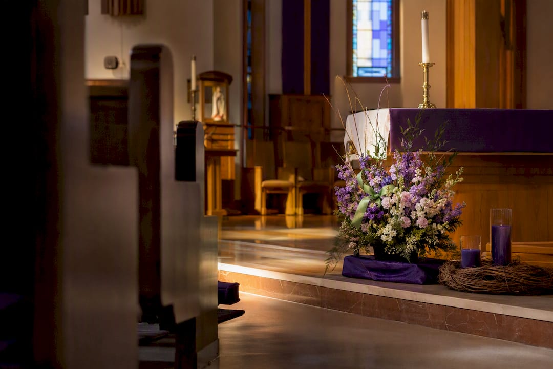 Seasonal church sanctuary decor in purple